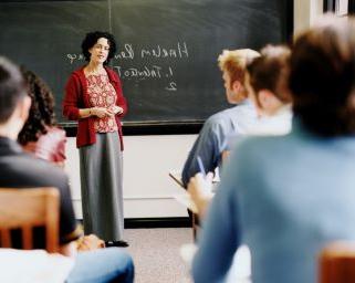 Teacher at front of classroom